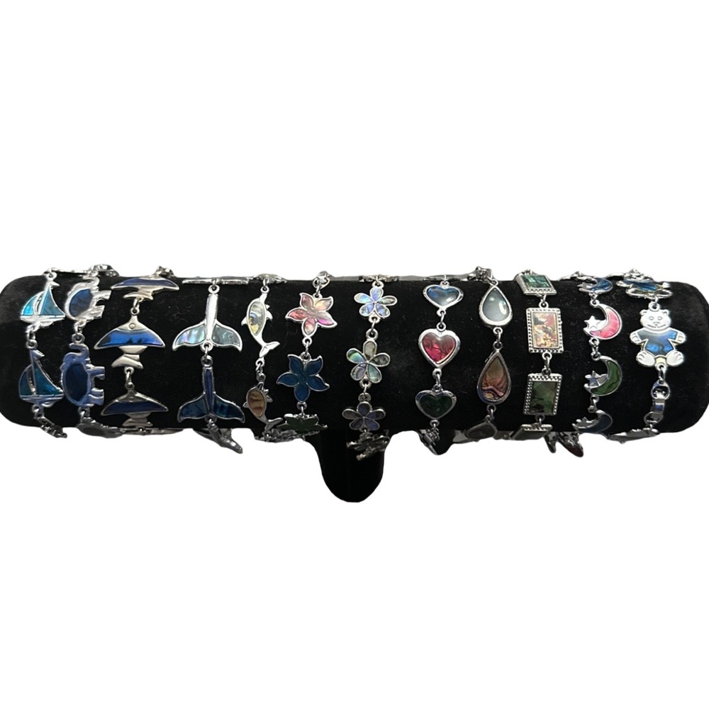VINTAGE various assortment of 12 different styles of cute charm bracelets.